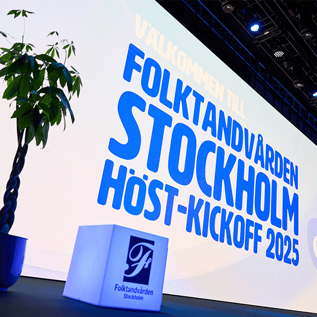 Large stage with welcome message for Folktandvården Stockholm’s Autumn Kick-off 2025 in Victoria Hall at Stockholmsmässan